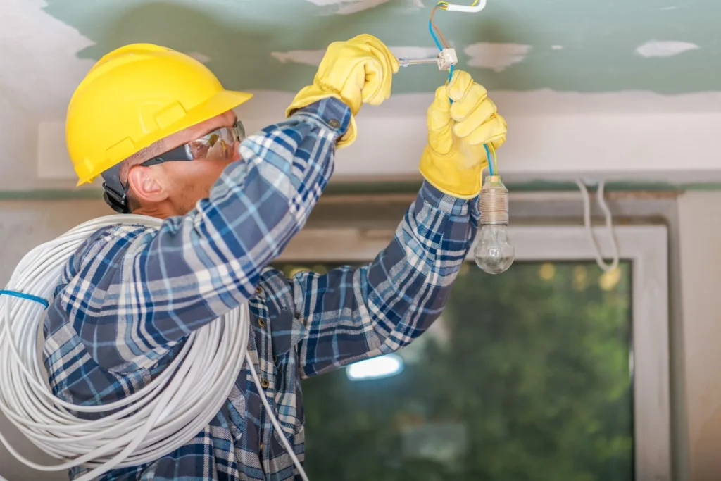caucasian electrician at work